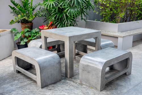Concrete Outdoor Furniture Set In The Small Garden Including On
